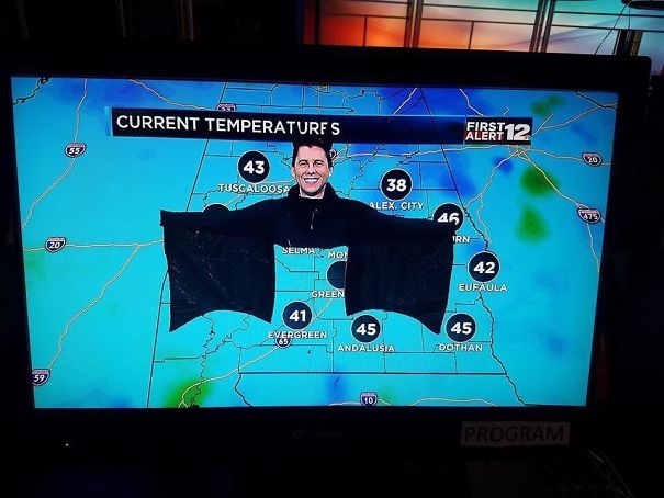 My Local Weatherman Dressed As A Bat For Halloween
