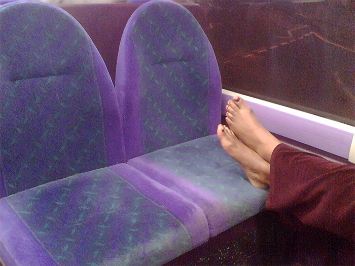 Putting Your Feet All Over Somebody Else’s Space On Planes And Trains