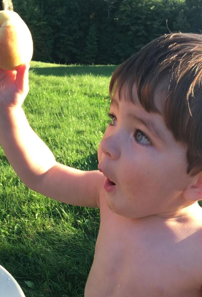 The First Time I Visited My Girlfiend (Now Wife) In College I Bought A Peach Tree From A Local Nursery And Told Her, "Someday We Will Eat Peaches From It Years From Now, Because We Will Still Be Together." Well It Worked Better Than I Planned. Here Is Our Son Eating A Peach From That Very Tree
