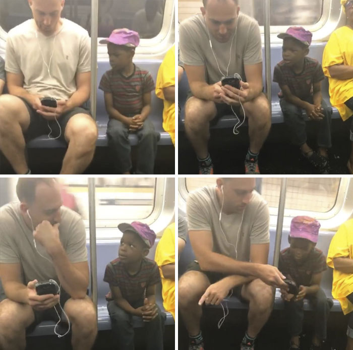 Este hombre comparte su móvil con un niño en el metro