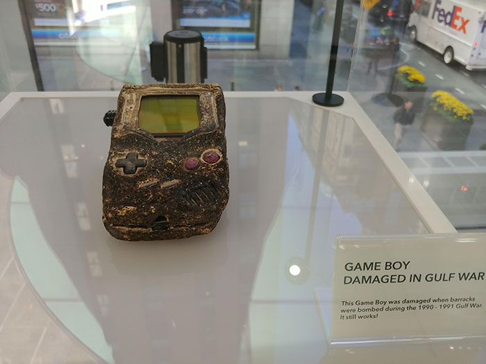 I Visited Nintendo Mecca Today And Saw It. "This Game Boy Was Damaged When Barracks Were Bombed During The 1990 - 1991 Gulf War. It Still Works"