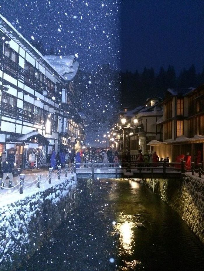 Caught Someone Else’s Camera Flash When Taking This Photo Of Snow Falling At Ginzan Onsen