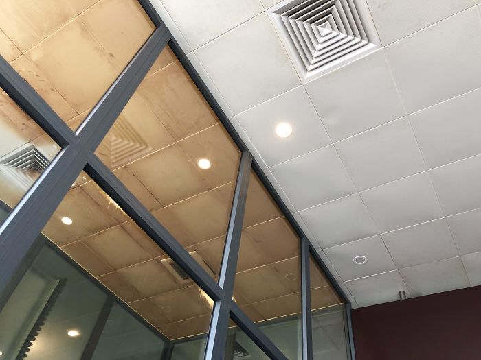 The Ceiling Tiles In The Da Nang Airport Smoking Section Vs. Non-Smoking Section
