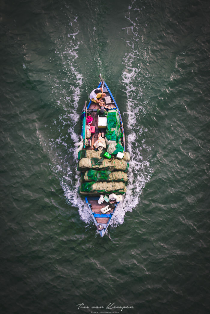 I Took Photos Of Passing Fishing Boats From A Bridge In Vietnam I Took Photos Of Passing Fishing Boats From A Bridge In Vietnam