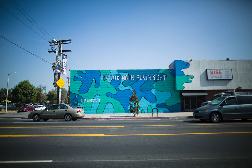 There’s Inexplicable Blue Camouflage Popping Up On Walls All Over Los Angeles, And I’m Here For It.