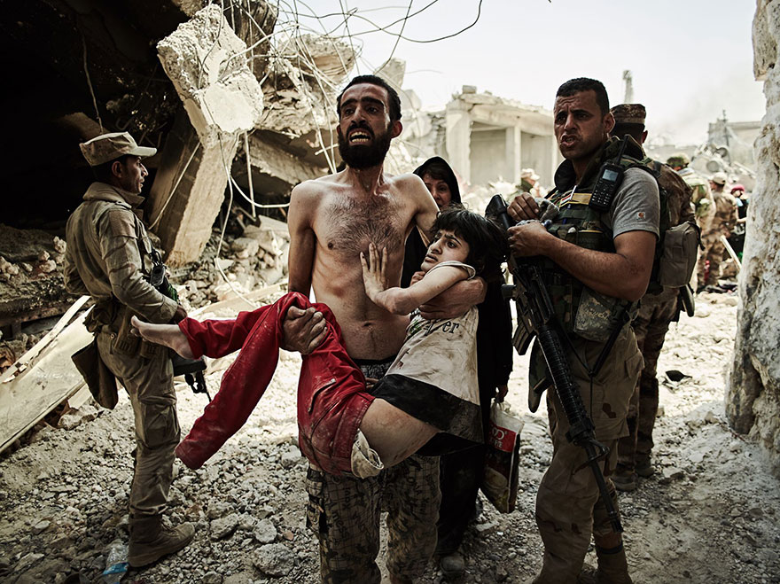 Man Carries Injured Son, Iraq (1st Place In Journeys And Adventures Category)