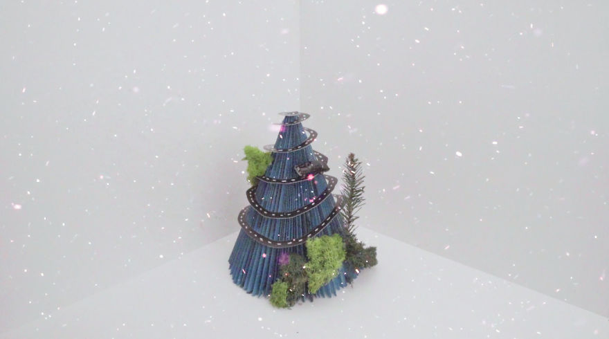 These Themed Christmas Trees Are Made From Old Magazines.
