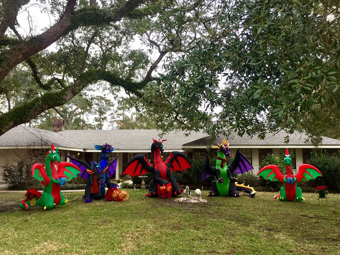 Neighbors Are Saying This Woman's Christmas Dragon Decorations Are Inappropriate, So She 'Fixes' It