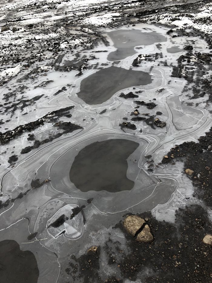 The Way This Picture Of A Frozen Puddle In My Backyard Looks Like A Landscape From The Perspective Of A Plane