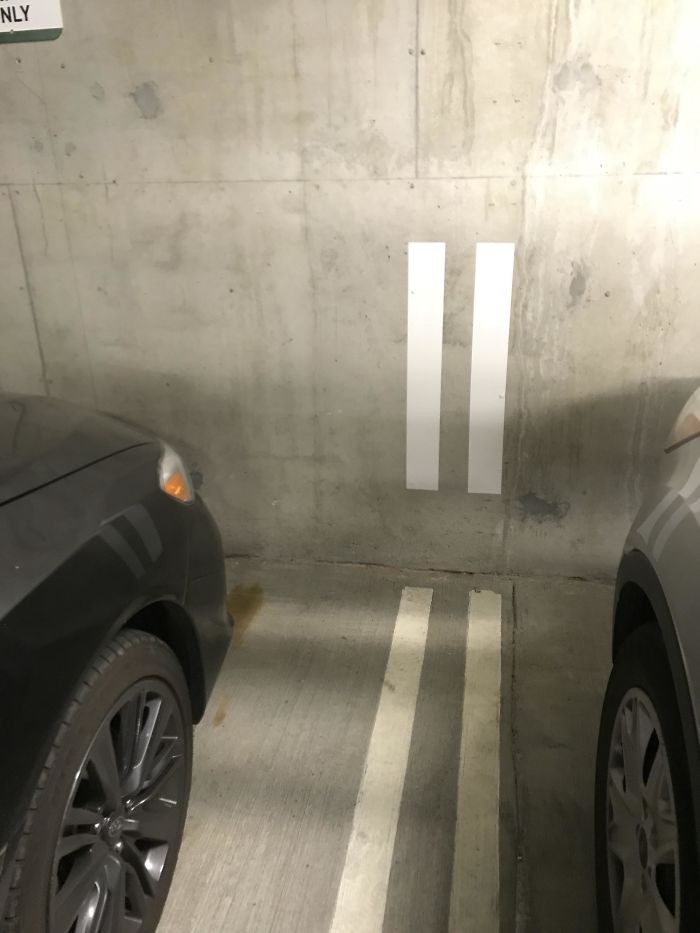 These Lines Go Up The Wall So You Can Park Perfectly In-Between The Lines