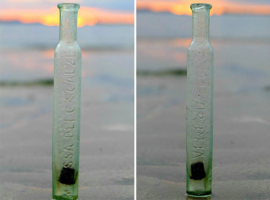 The Bottle With Healing Water Made From The Melissa Herb