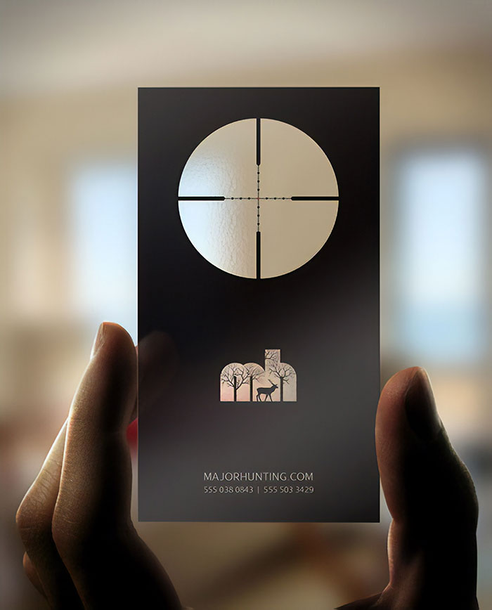 Business Card That Encourage Recipients To Play With The Card And "Hunt" Objects Around Them, As If They Were Looking Through The Scope Of A Rifle