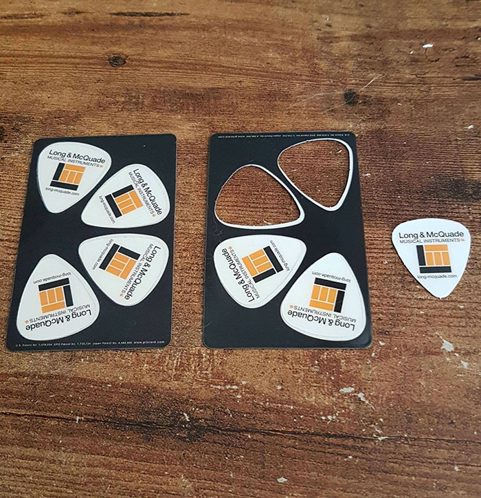 This Music Store's Business Cards Are Guitar Pics