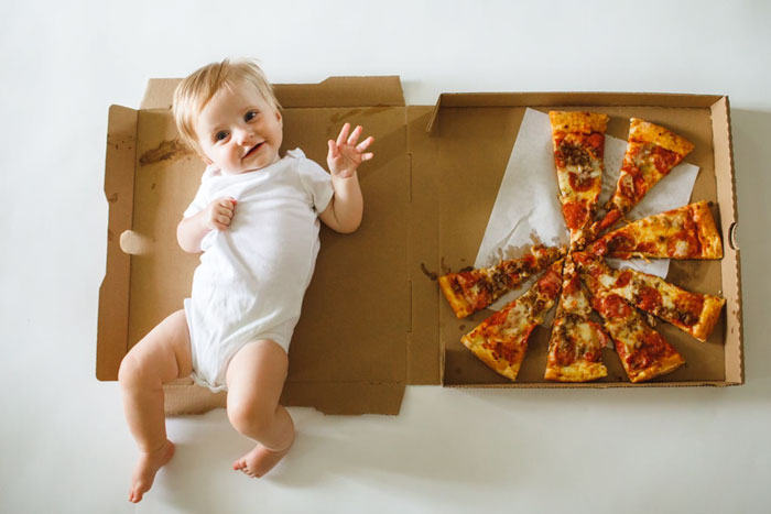 Mom Documents Her Baby's Growth During His First 12 Months Using Pizza Slices With Different Toppings