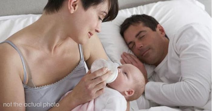 mom and dad sleeping with baby