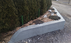Neighbors Kept Running Over This Family's Fence, So Dad Replaces It With Concrete And Wrecks 8 Of Their Cars