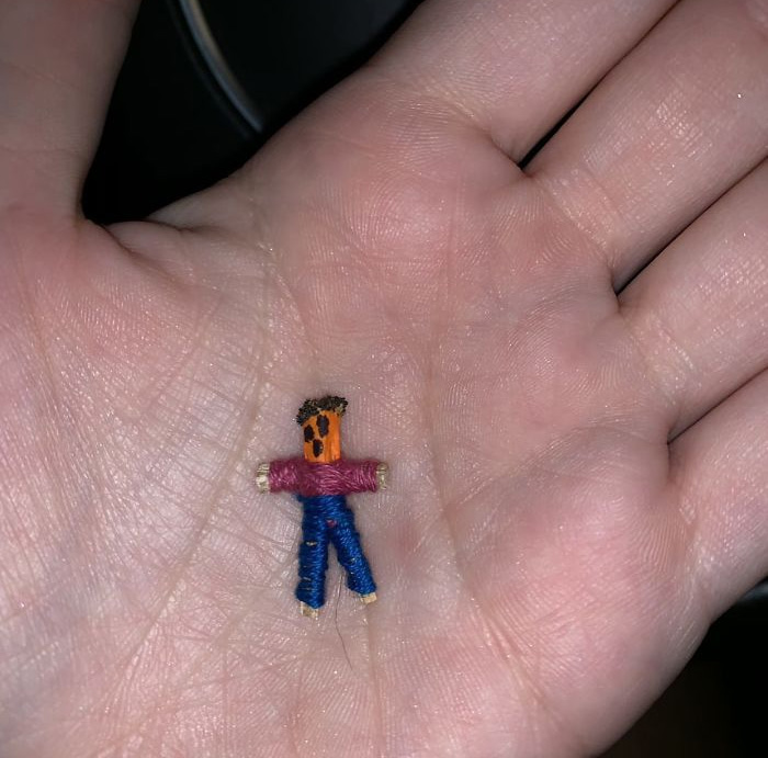 I Found This Little Guy Under A Stair In A Parking Garage At The Mall. The Clothing Is Made Out Of Thread And His Hair Is Made By What Seems Like Glue Dipped Into Dirt. What Is This Thing?