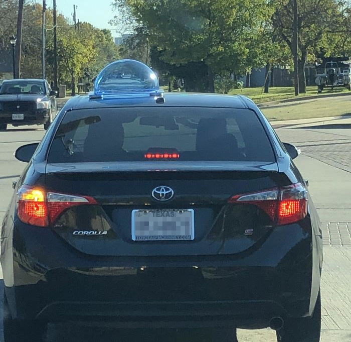 Circular Object On Top Of Car. What Is This Thing?