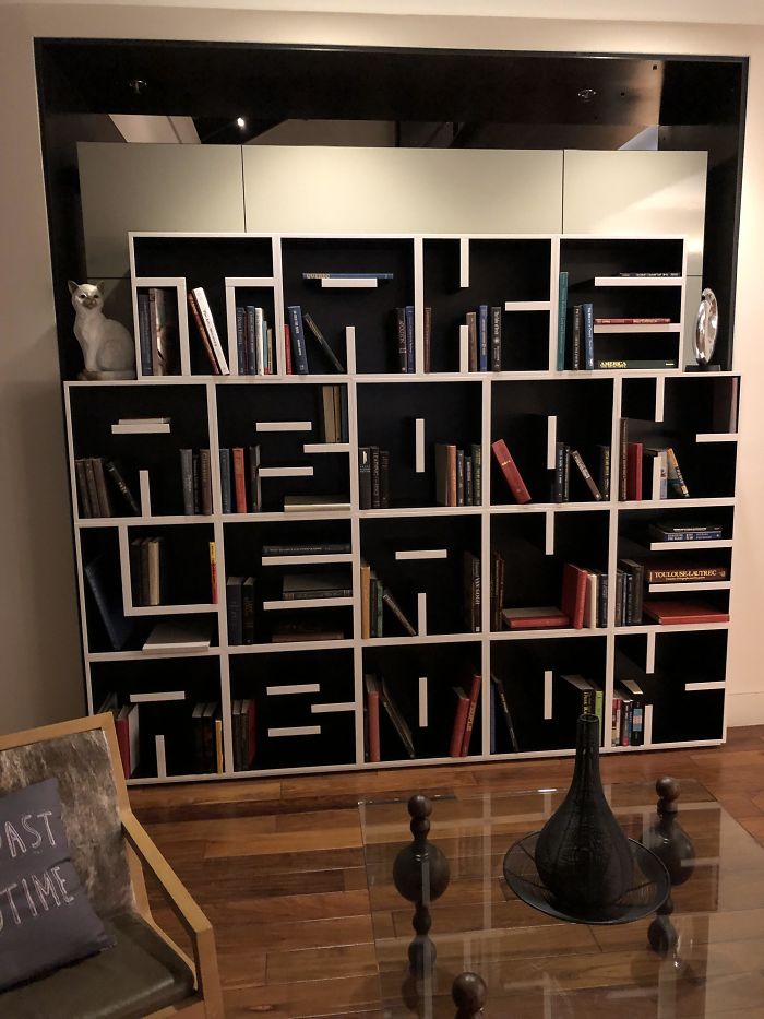 Bookshelf Whose Shelves Spell "Take A Book Leave A Book", Seen At A Hotel