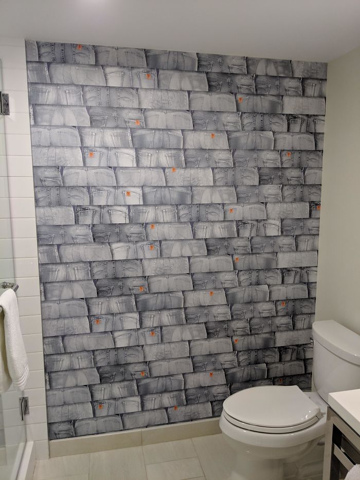 This Hotel Bathroom "Tile" Wall Is Actually Just Numerous Pictures Of Denim-Clad Asses
