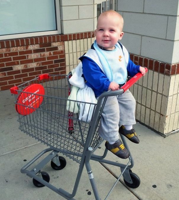 The Miniature Shopping Carts At The Local Pharmacy Make My 11-Month-Old Son Look Like A Giant