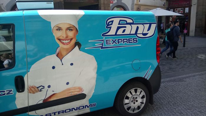 Yeah Let's Just Make Her Mouth Real Huge, To Signify That We're A Catering Company. Won't Be Unsettling In The Slightest!