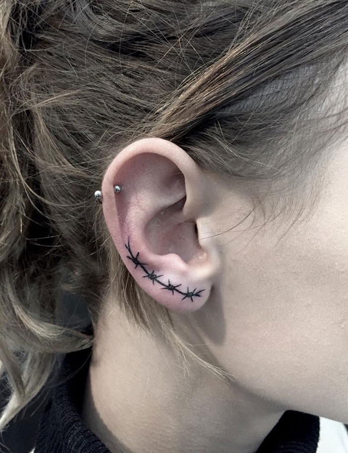 Ear Barb Wire Tattoo