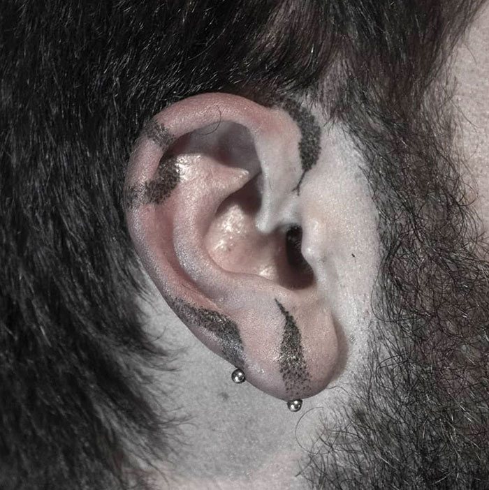 Dot-Work Ear Snake Tattoo