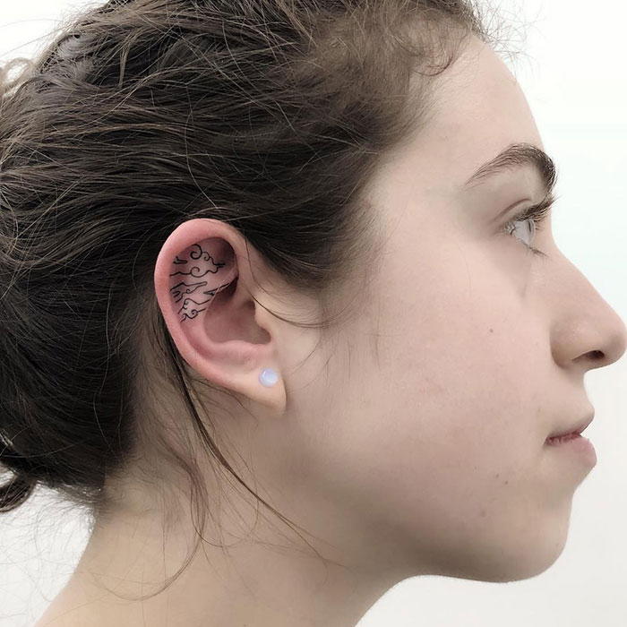 A Tiny Piece Of Tattoo Art In An Ear