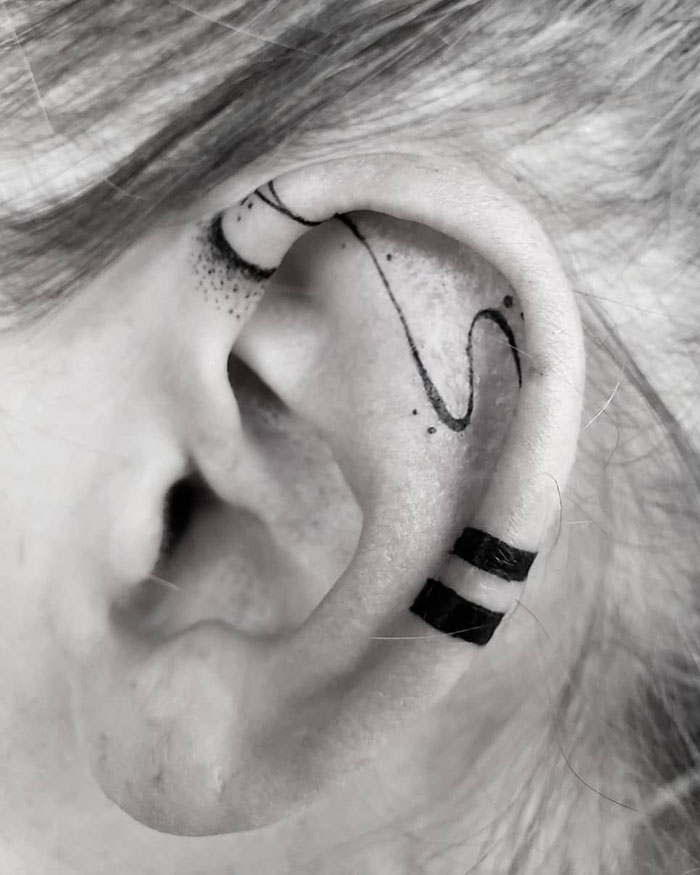 Fine Line Work Ear Tattoo