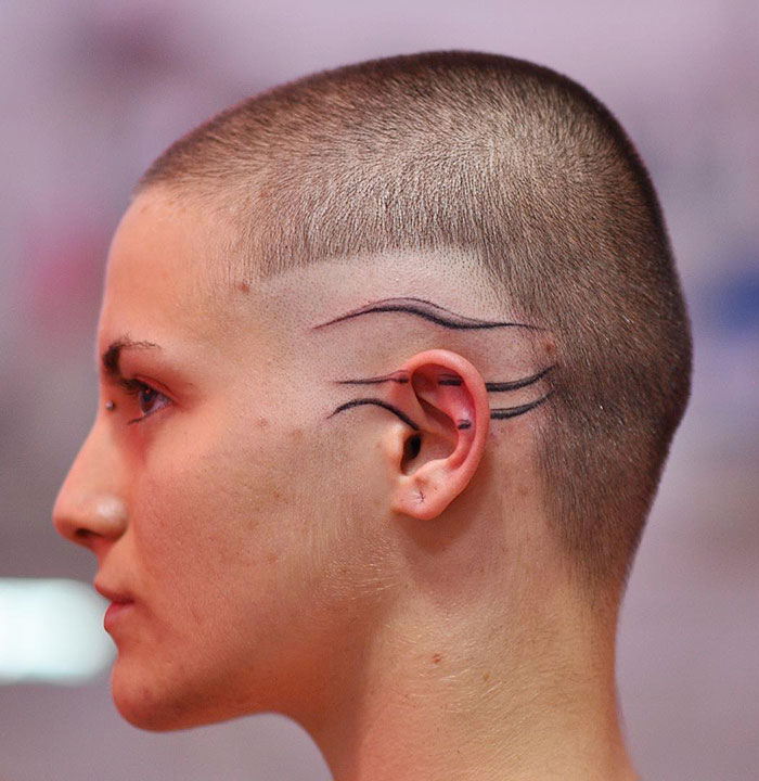 Combination Of Ear And Head Tattoos