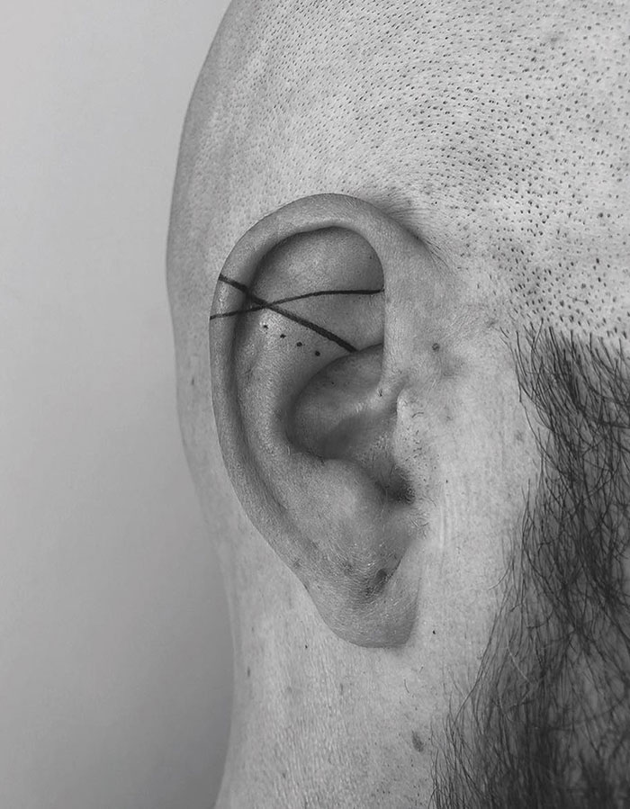 An Ear Tattoo - How Cool Is That. The Abstract Design And Neat Line Work