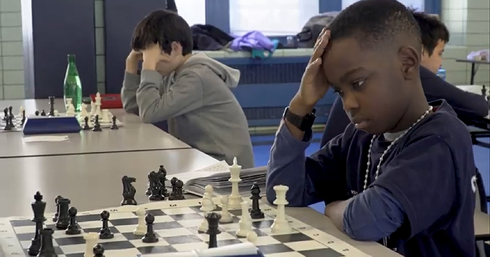 8 Year-Old Homeless Refugee From Nigeria Wins Chess Championship In New York