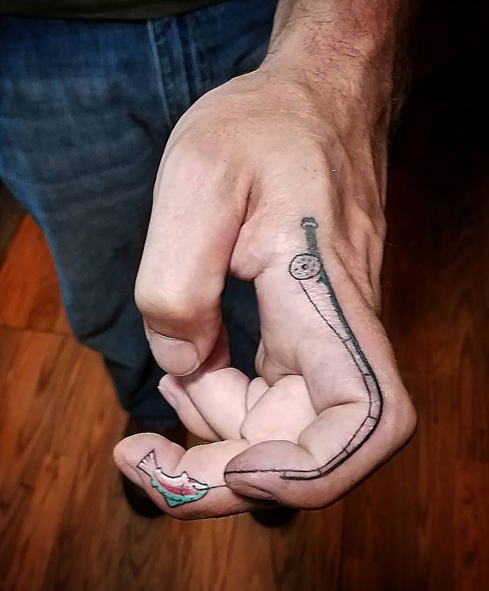 Funny Fisherman's Finger Tattoo