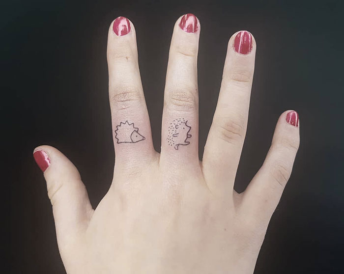 Adorable Hedgehog Finger Tattoos