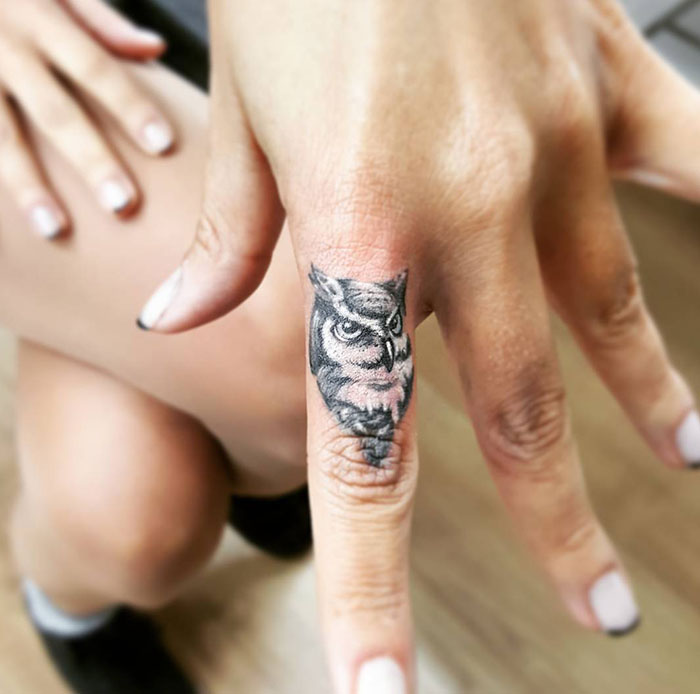 Tiny Owl Finger Tattoo
