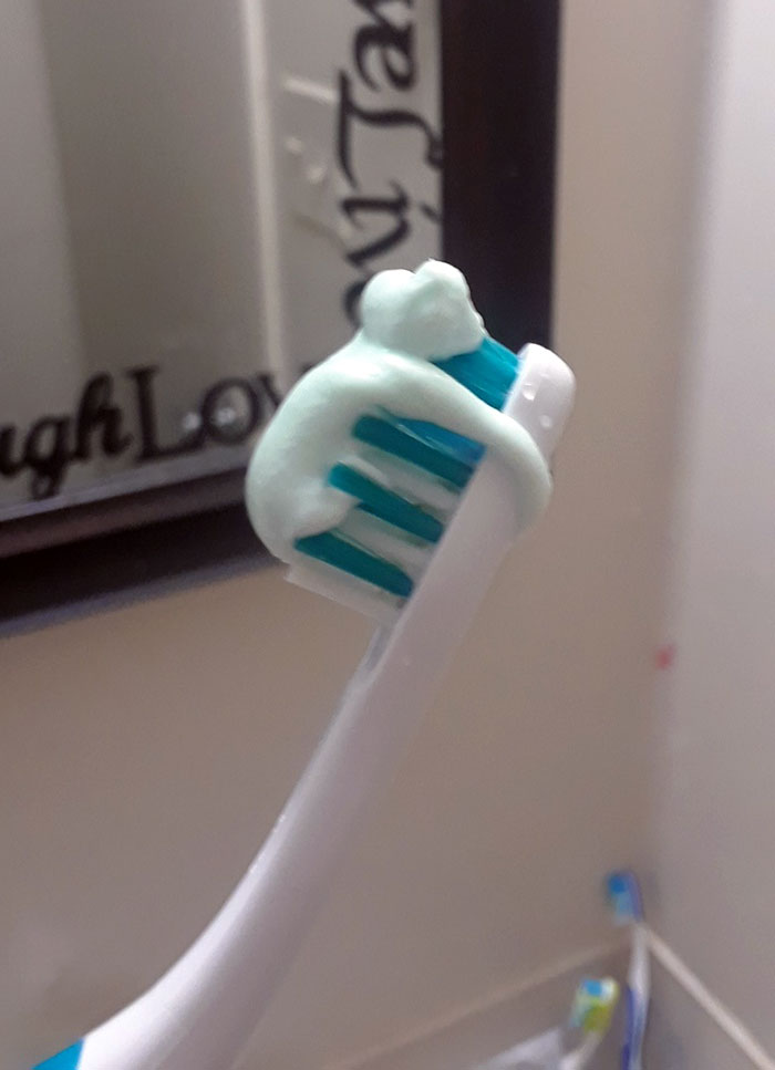 A Bit Of Toothpaste That Looks Like A Baby Monkey Holding Onto My Toothbrush
