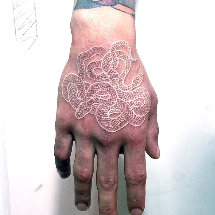 Beautiful White Ink Snake Tattoo