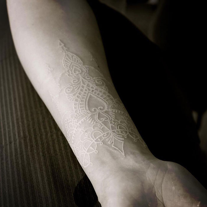 Just A Quick Glance And You Might Miss The Beauty That Lies Within This White Ink Tattoo