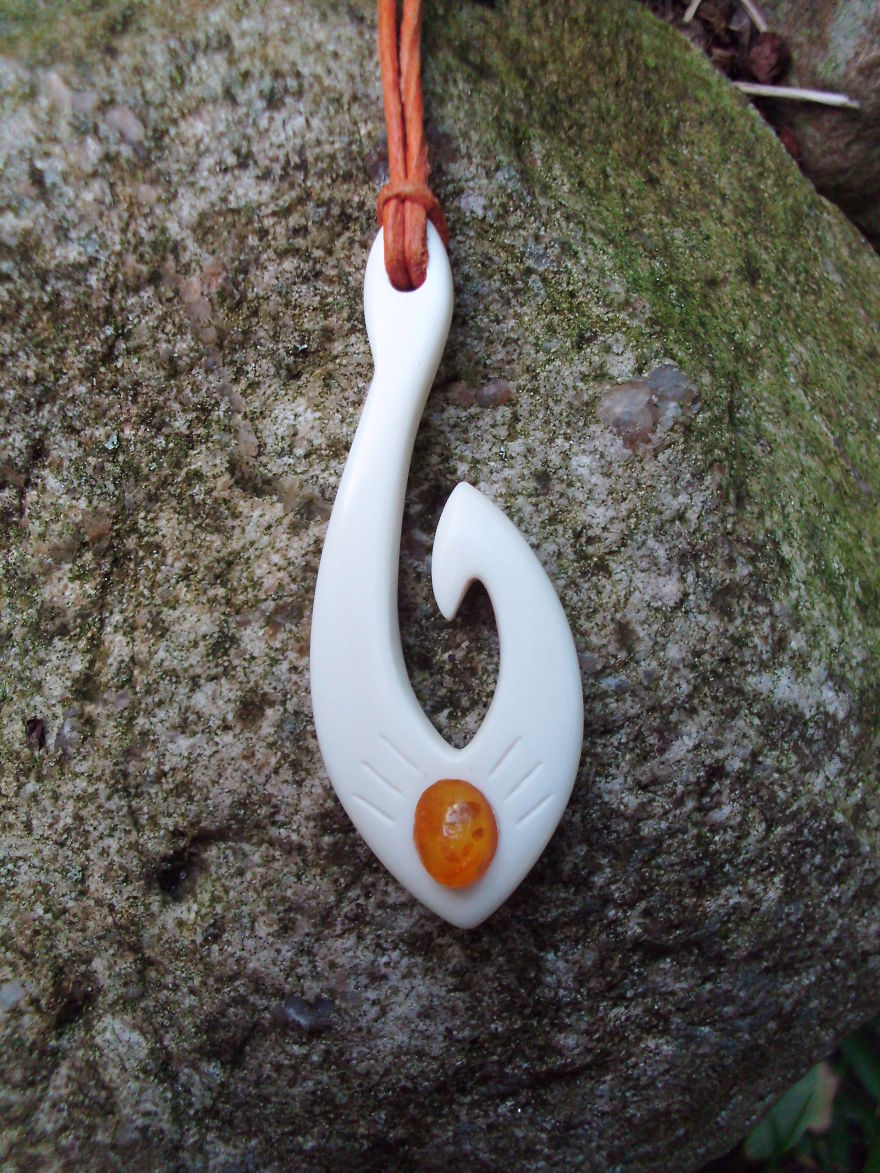 Fishhook With Amber, Success Symbol