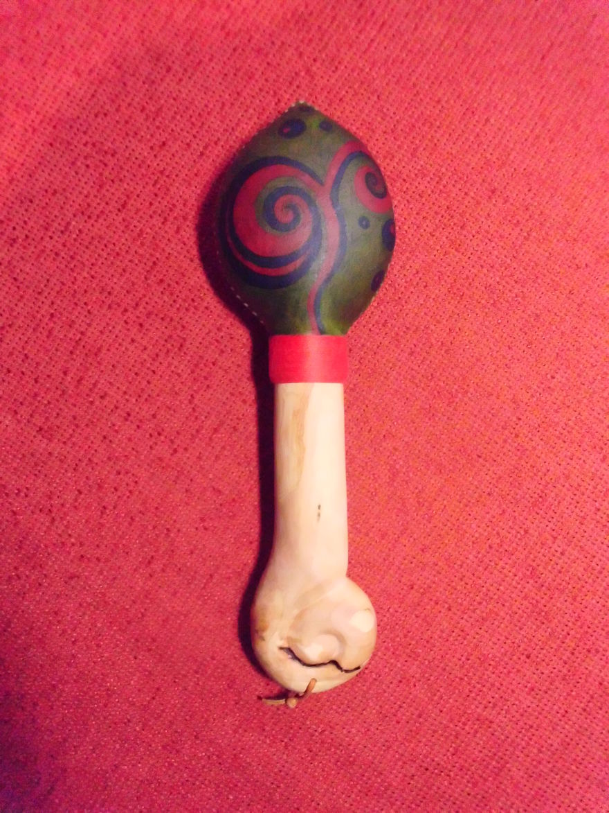 Rattle With A Carved Cherry Wood Handle