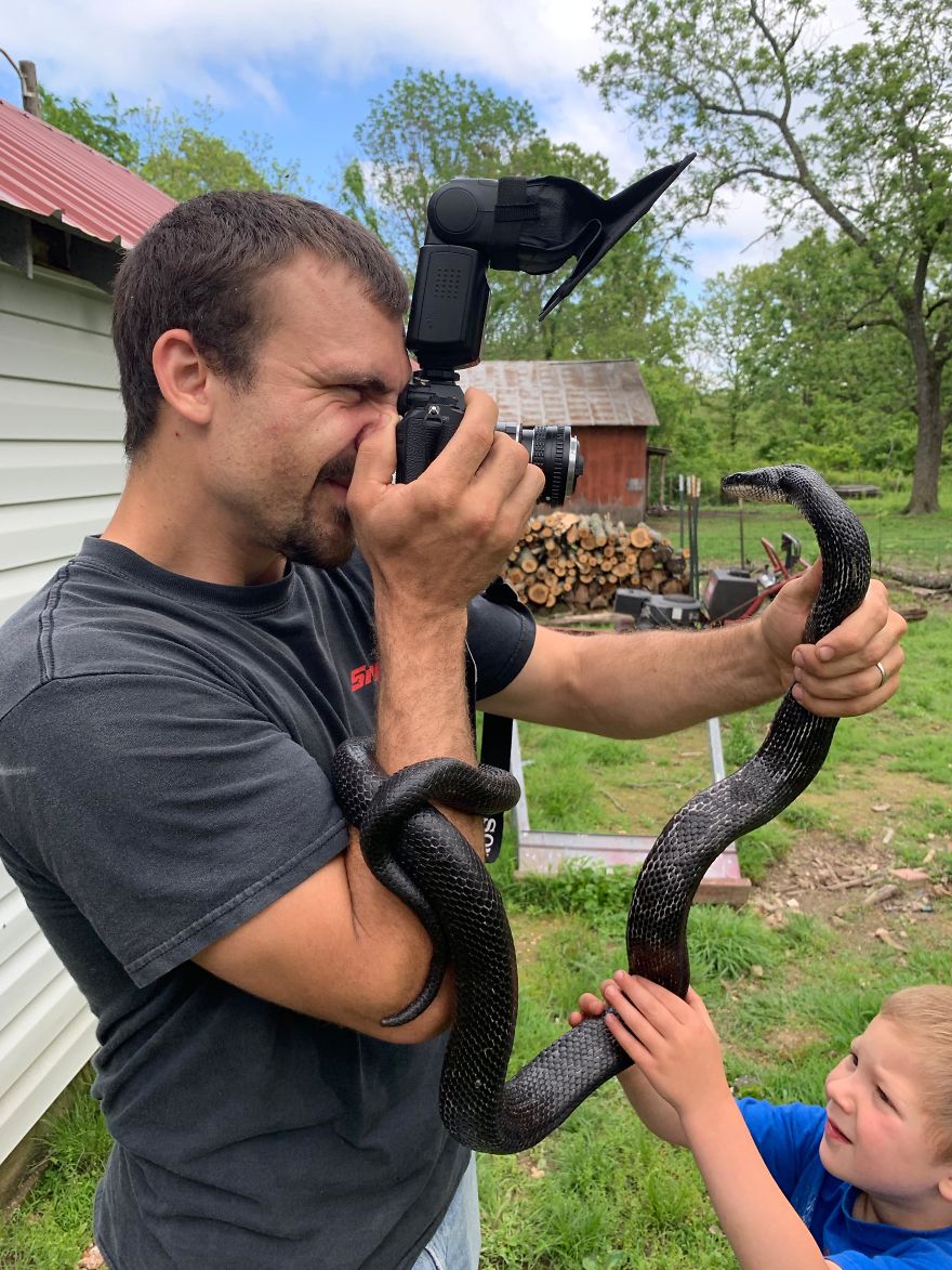 What Happens When A 6 1/2 Foot Black Snake Finds Its Way Into A Photographer's House