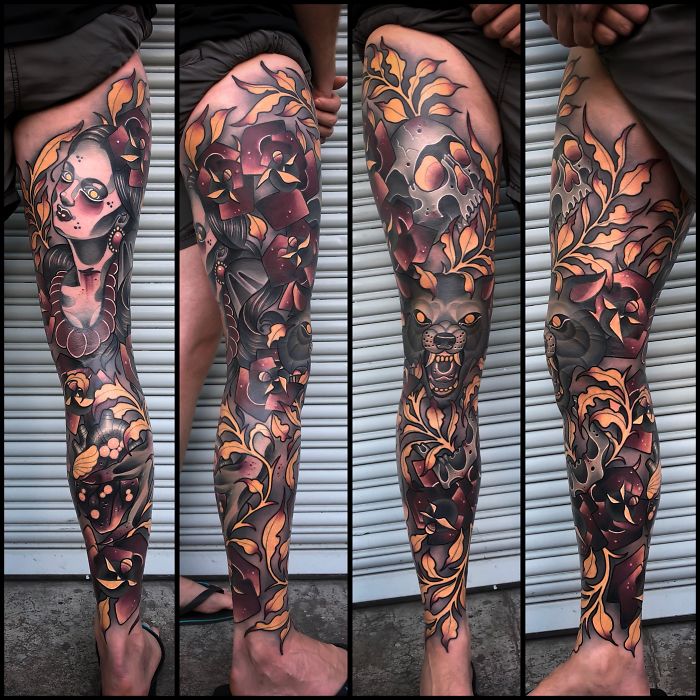 Woman flowers skull and wolf leg sleeve tattoo