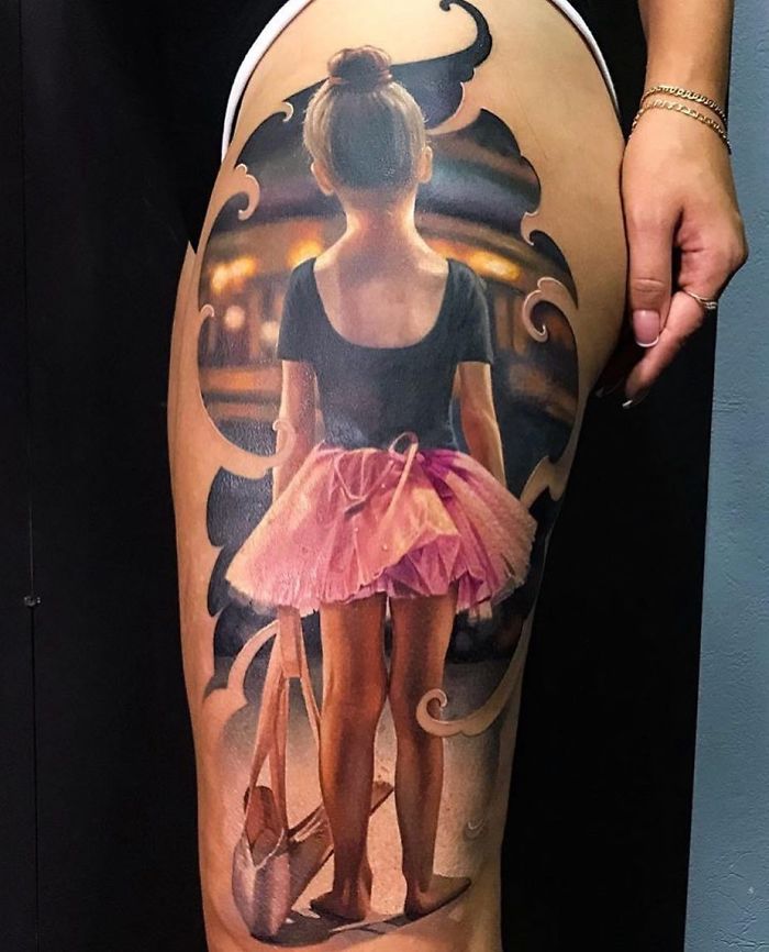 Portrait of dancing ballerina girl leg tattoo