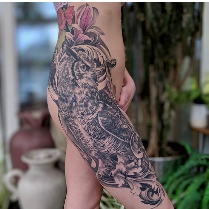 Owl with flowers leg sleeve tattoo