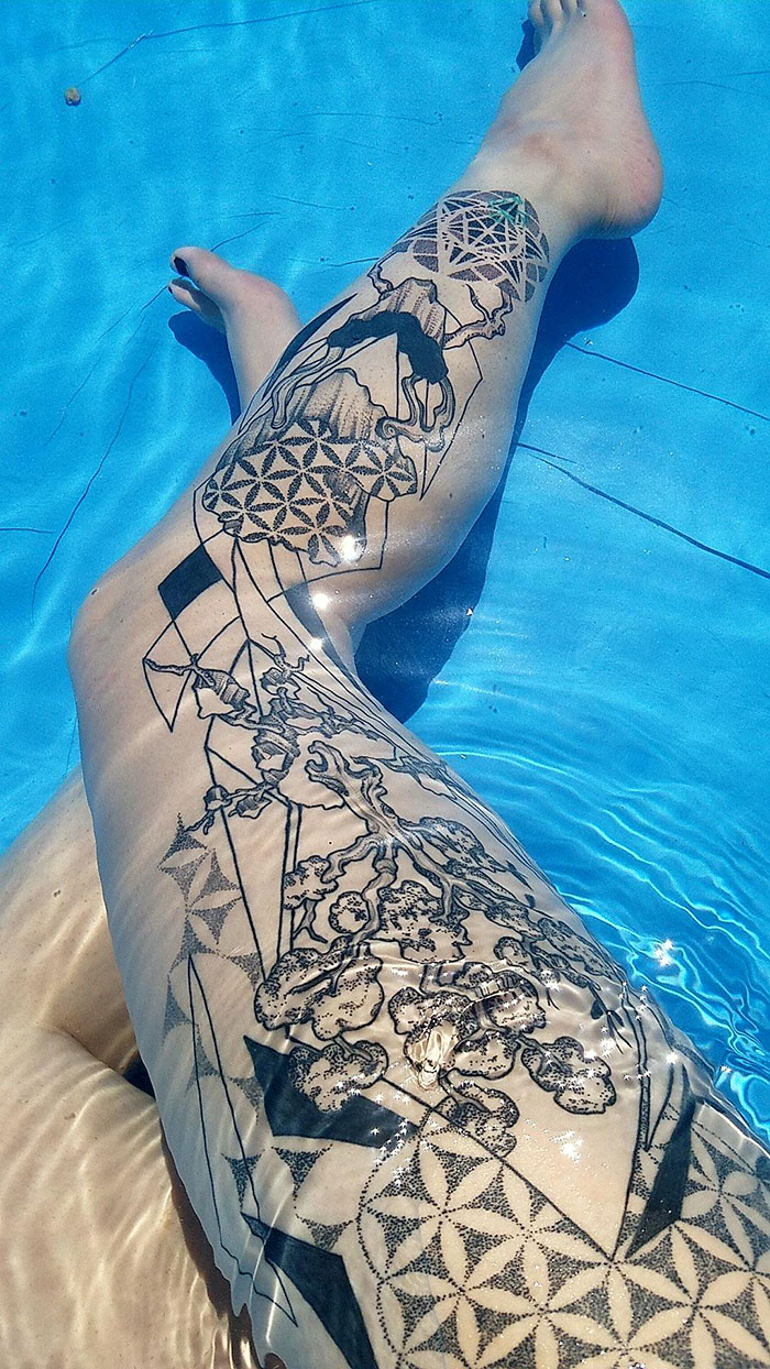 Geometrical with tree of life leg sleeve tattoo