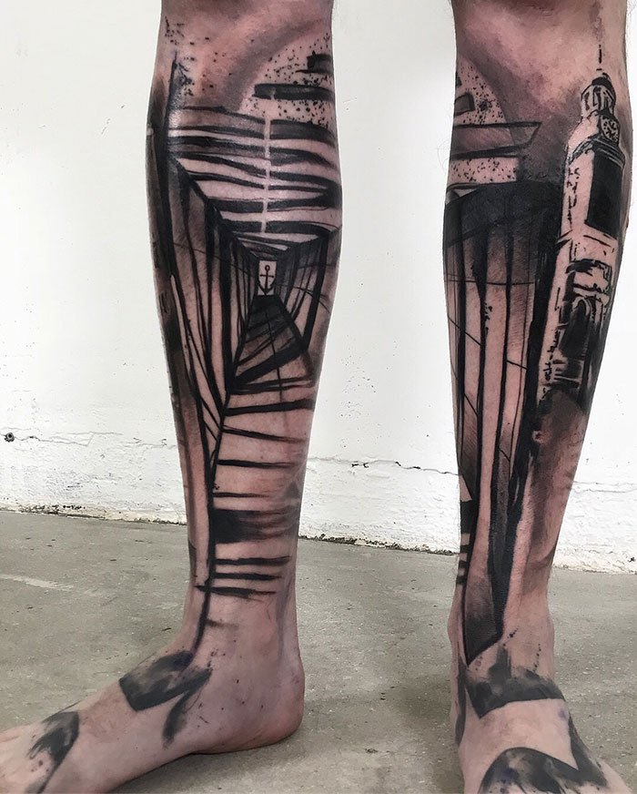 Abstract tower leg sleeve tattoo