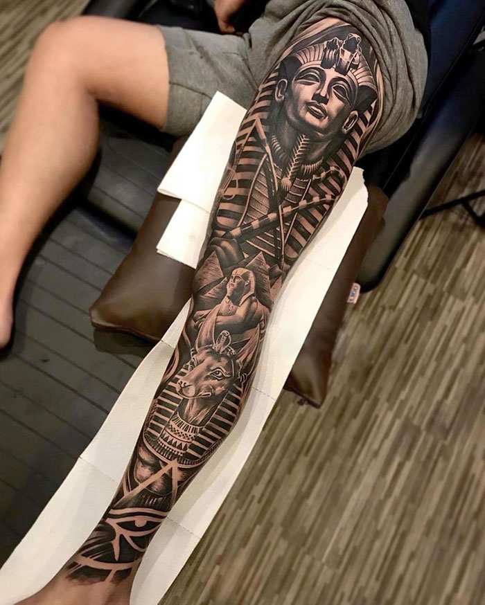 Egyptian leg sleeve tattoo