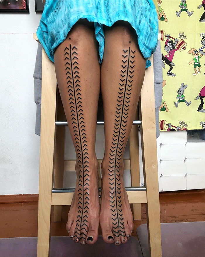 Simple line leg tattoo