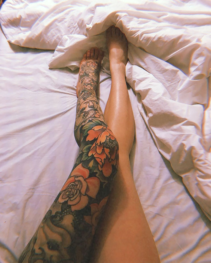 Colorful floral leg sleeve tattoo